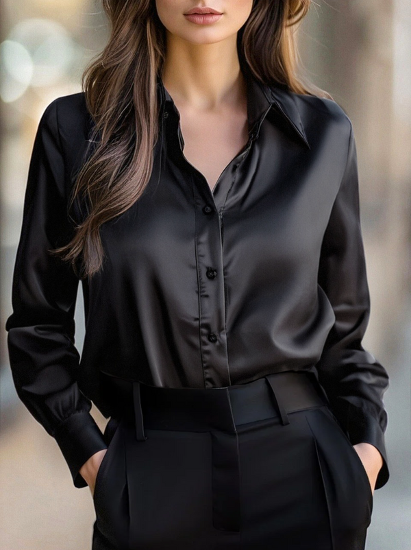 Elegante schwarze Satinbluse mit langen Ärmeln