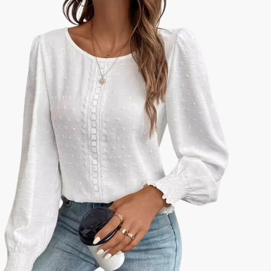 Lockere Damenbluse mit Rundhalsausschnitt und gestickten Details 0